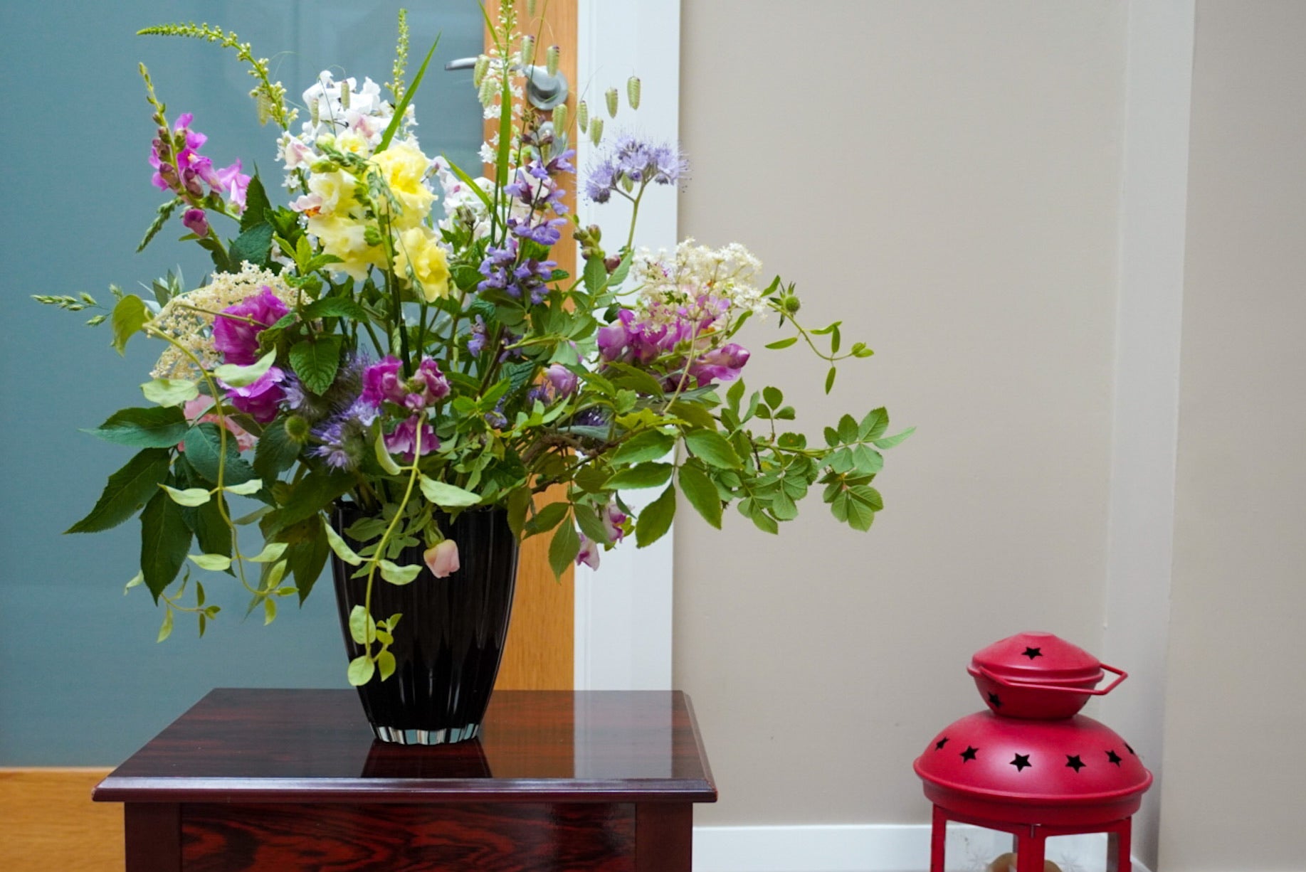 Floral arrangement with seasonal flowers grown in Naas.