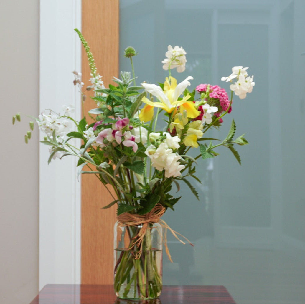 Bouquet of seasonal flowers grown in Naas. This arrangement is sold in a jar.
