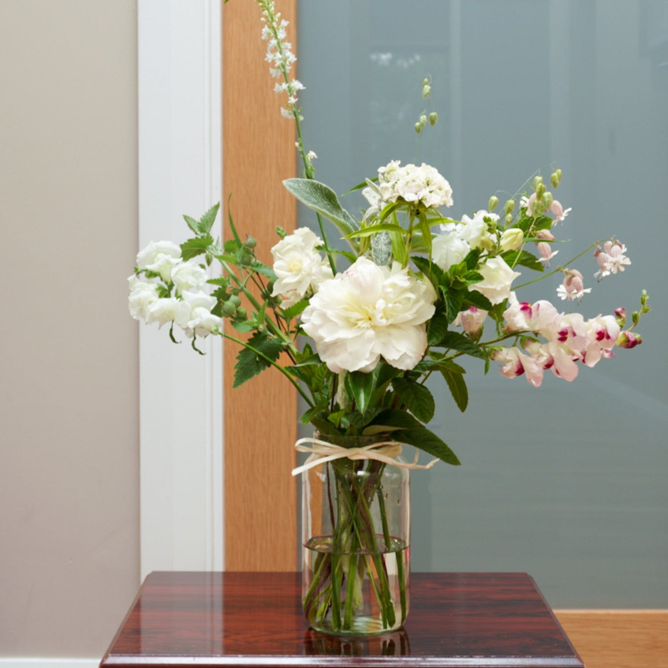 Bouquet of seasonal flowers grown in Naas. This arrangement is sold in a jar.